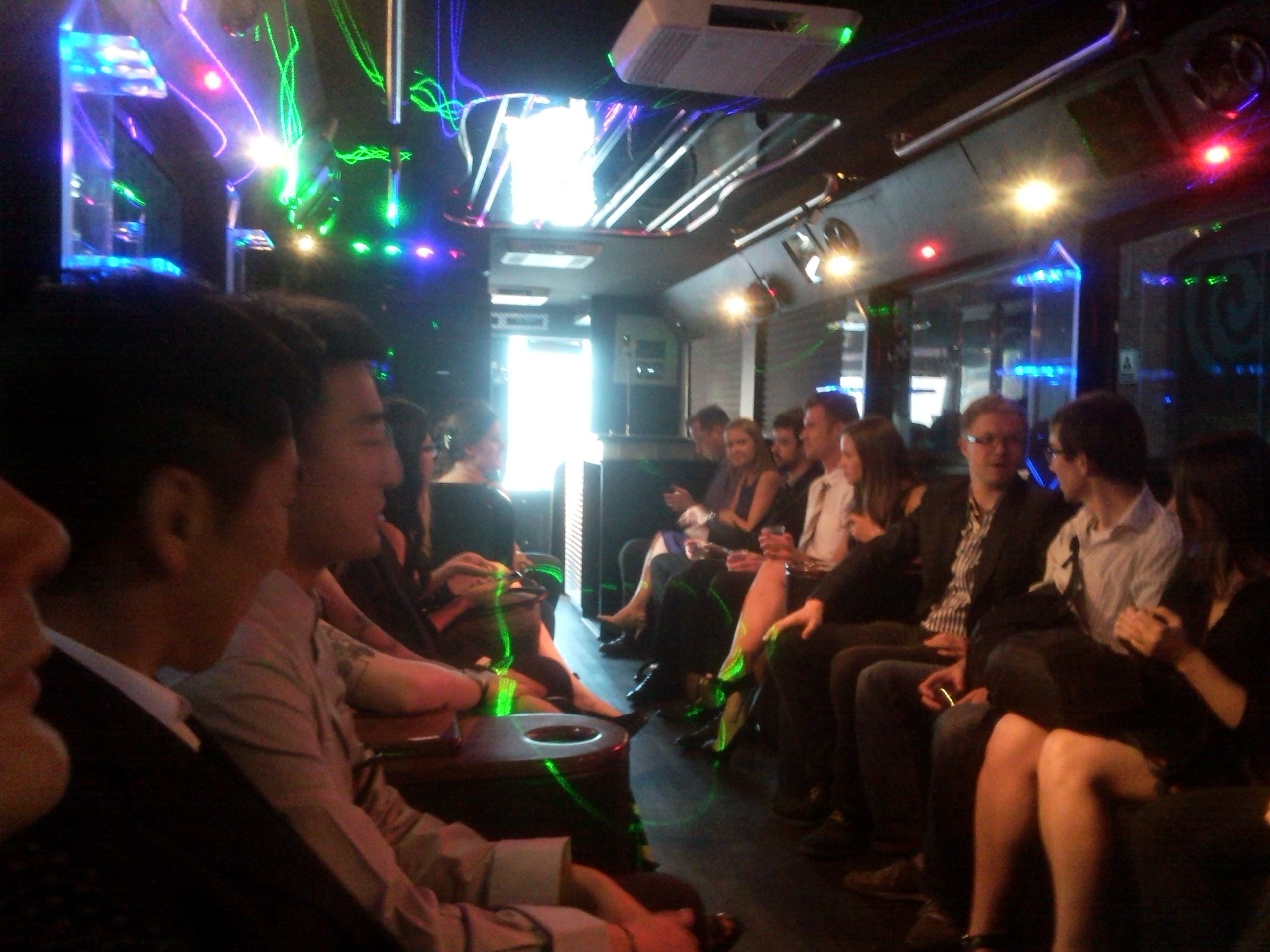 On the party bus - Evgeny and Renat chatting while we wait to get going