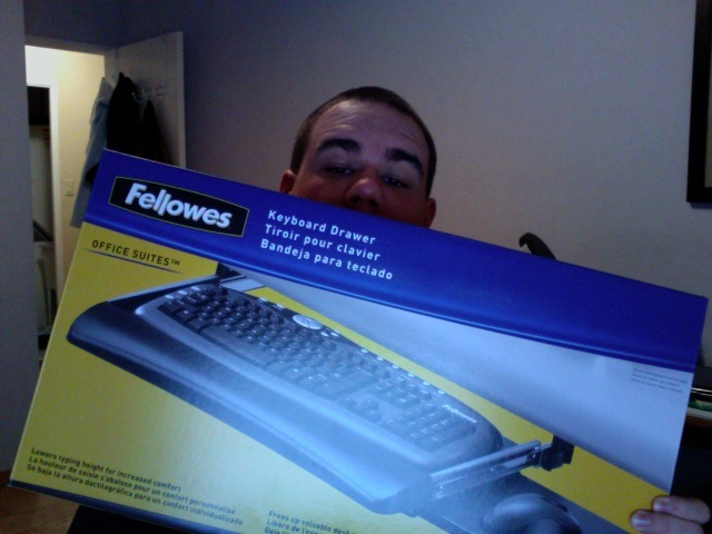 Me holding a new keyboard tray